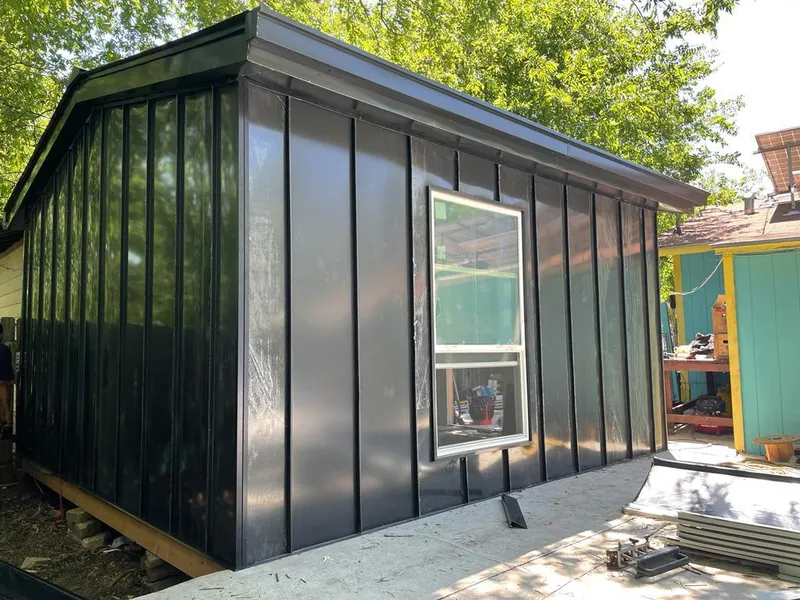 Black standing seam metal wall panels for Roof Inspection in Ranchettes