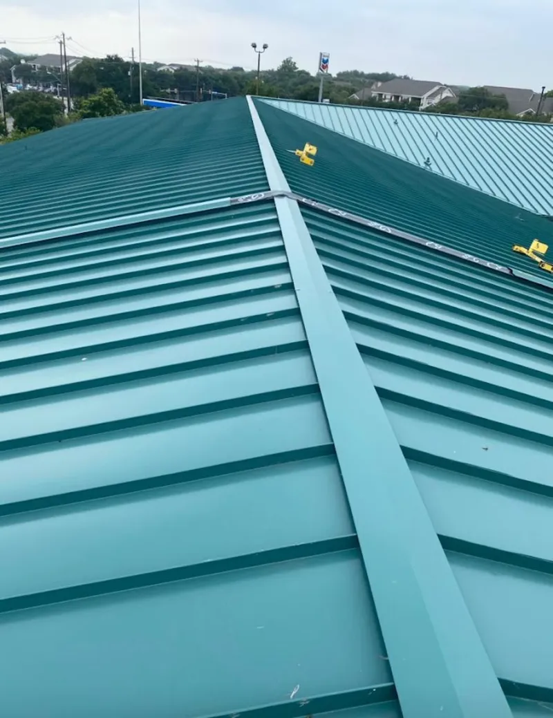 Green commercial metal roof ridge and valley for Metal Roof Repair in Ranchettes
